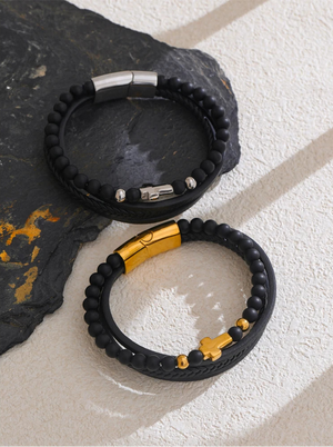 Trinity Cross – Armband i svart läder med gulddetaljer