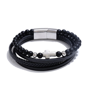 Trinity Cross – Armband i svart läder med gulddetaljer